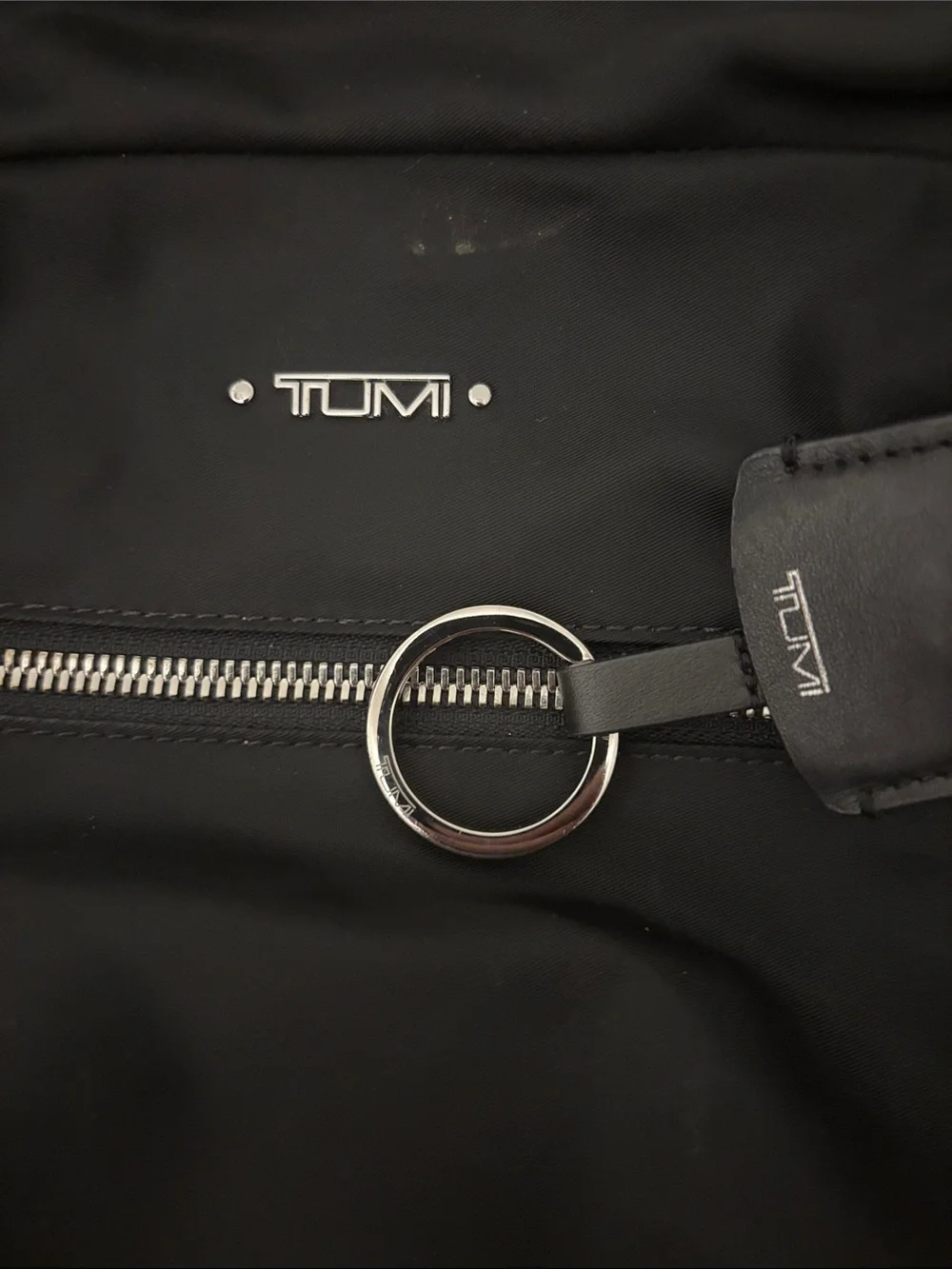 Tumi Black Nylon Backpack with Front Zip Pockets